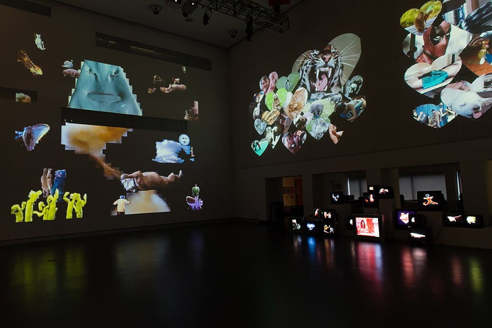 Ungentrified installed as a multi-channel projection with banks of CRT monitors.